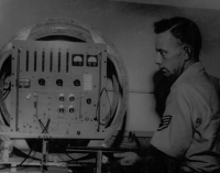 Lowry AFB PMEL School, 1963; Andre Grabel Measuring Pellet Speed.  [G. Blood]